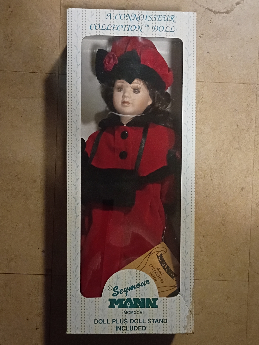 Red & Black Porcelain Collector Doll with Stand